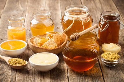 various-honey-on-wooden-table.jpg